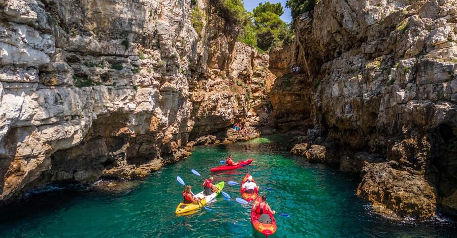 Pula: Kayak Adventure with Cave & Island Snorkeling - The first paddle to Grotta di quarzo