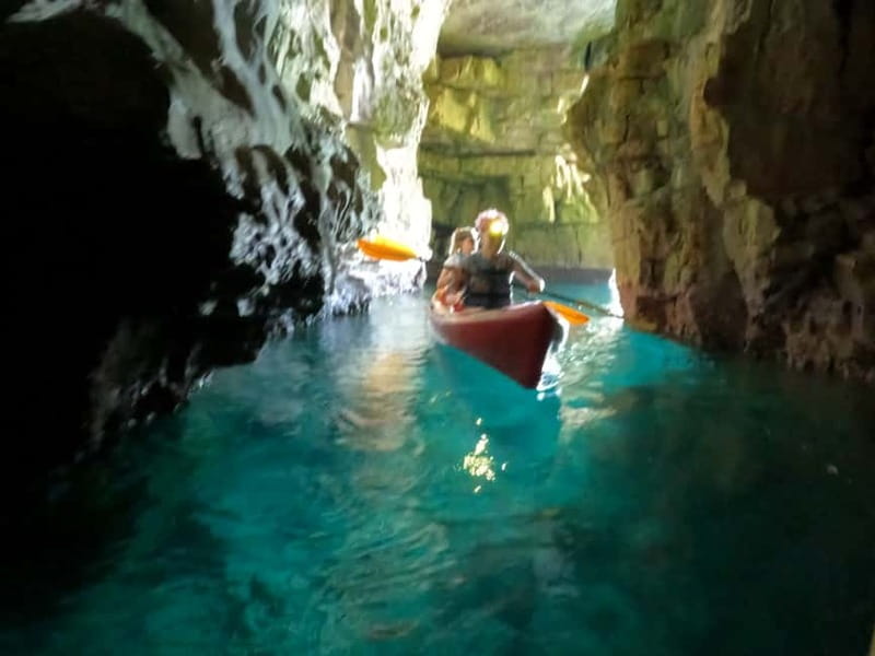 Pula: Kayak Tour, Cliff Jumping, Snorkeling & GoPro Pictures - Entering Sea Canyon by kayak