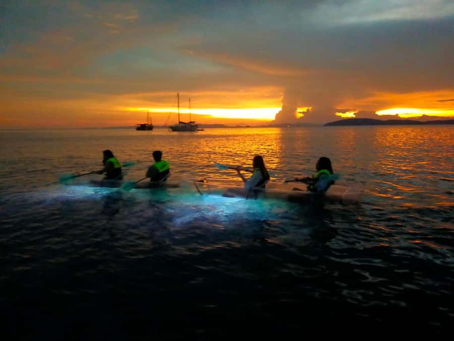 Railay: Illuminated Clear Kayak Night Tour Bioluminescence - Sunset beneath Railay’s famous limestone cliffs