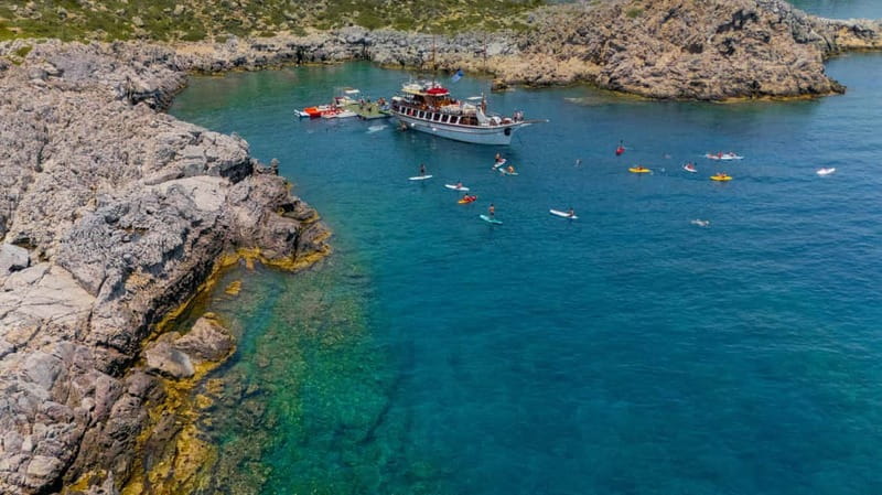 Rhodes: Gulet Trip with Food, Drinks, SUP, Kayak & Swimming - Kallithea Springs: architecture from the water