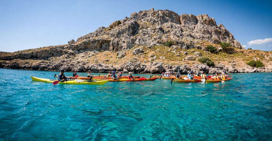 Rhodes: Sea Kayak Adventure to the Red Sand Beach - Reaching Red Sand Beach for swimming and snorkeling