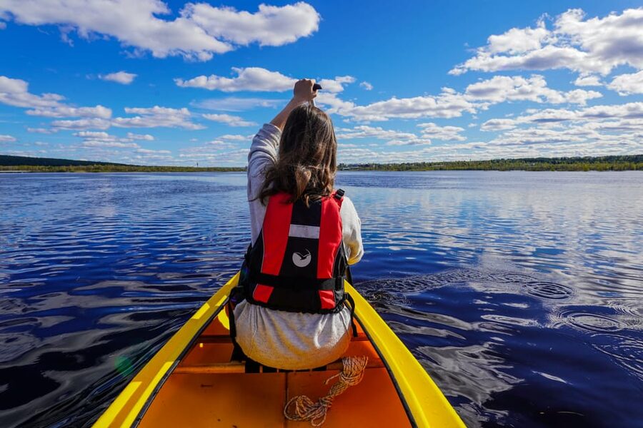 Rovaniemi: All-Day Canoe Adventure - Paddling across the lake near Rovaniemi