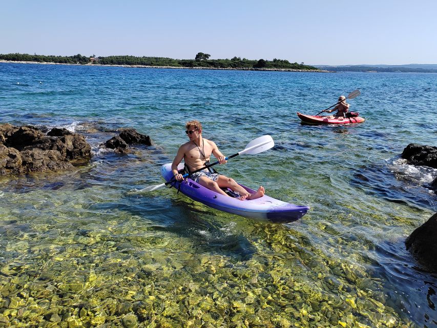 Rovinj: Golden Cape Desert Islands Kayak & Snorkeling Tour - Safety briefing and tandem kayak setup