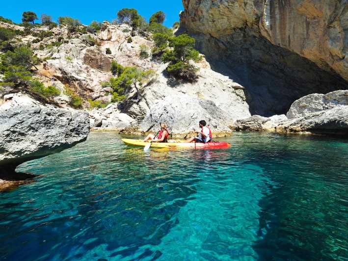 Sant Elm: Guided kayak tour to Cala en Tío with caves - Guides, language, and the feel of the group