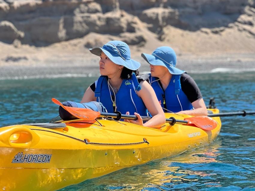 Santorini: Sea Caves Kayak Trip with Snorkeling and Picnic - White Beach and the cliff-jumping option