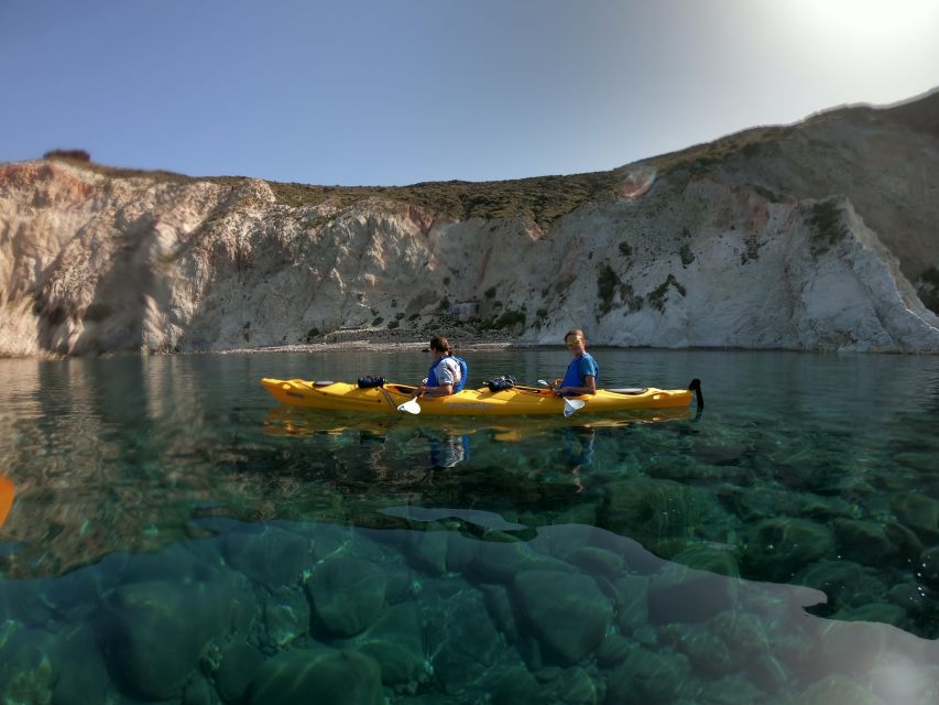 Santorini: Sea Caves Kayak Trip with Snorkeling and Picnic - Paddling past Akrotiri’s volcanic rock