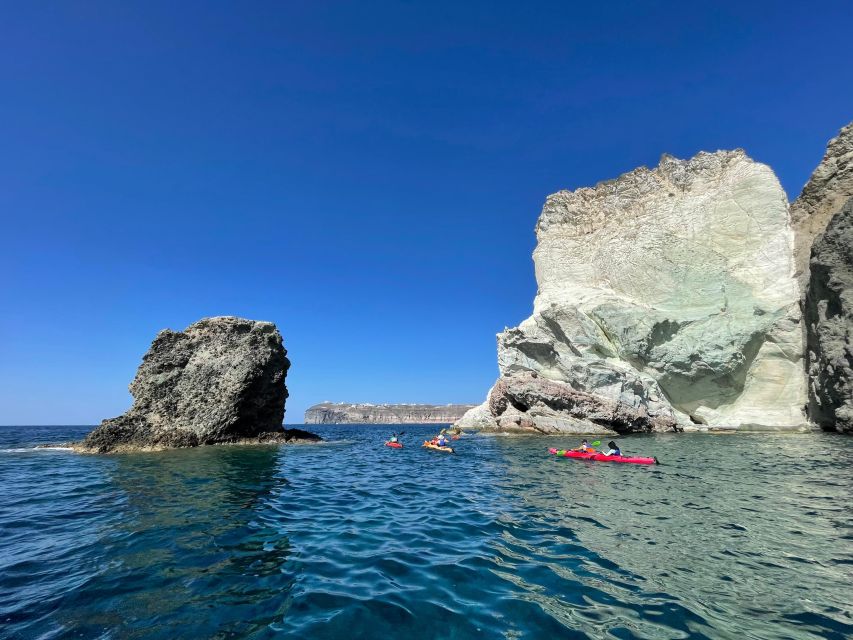 Santorini: South Sea Kayaking Tour with Sea Caves and Picnic - Red Beach and the volcanic cliffs