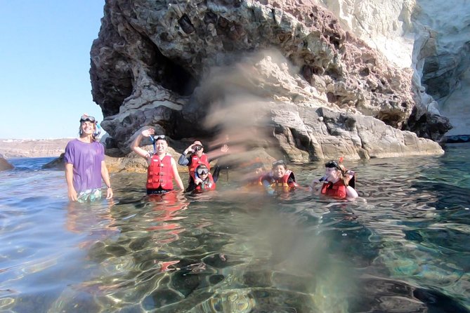 Santorini: Stand-Up Paddle and Snorkel Adventure - Paddling beside Santorini’s cliff-lined coast
