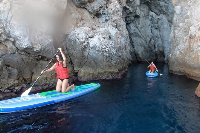 Santorini: Stand-Up Paddle and Snorkel Adventure - The cove and small cave are the memorable moments