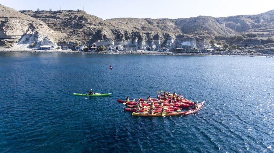 Santorini: Sunset Sea Kayak with Light Dinner - Red Beach and Santorini’s volcanic color palette