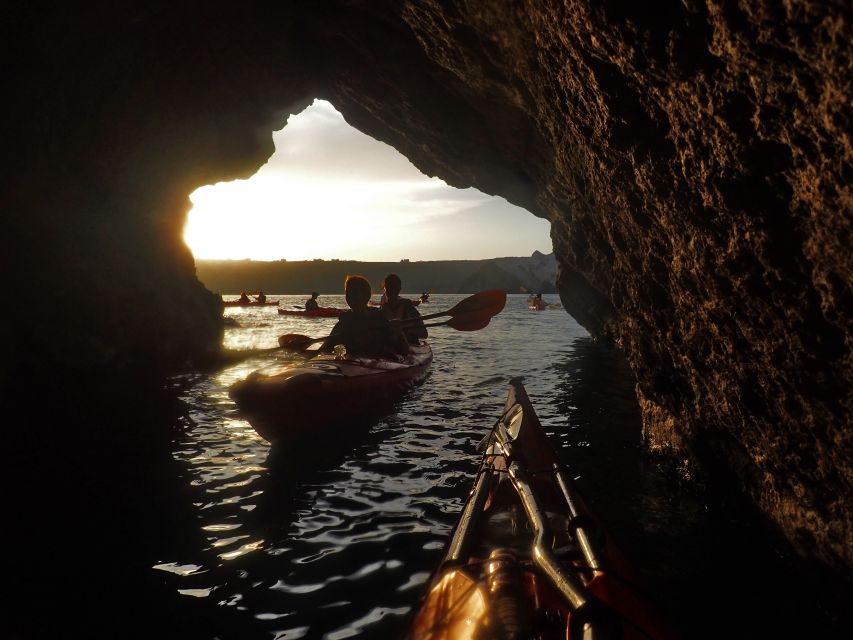 Santorini: Sunset Sea Kayak with Light Dinner - Kampia Beach for swimming, snorkeling, and a fresh snack