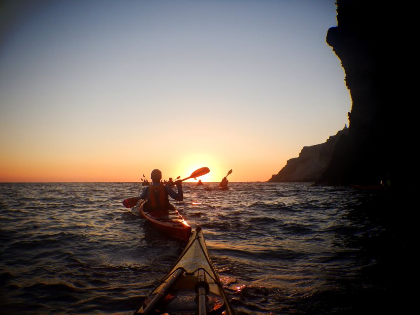 Santorini: Sunset Sea Kayak with Light Dinner - Returning to Mesa Pigadia and sitting down to dinner