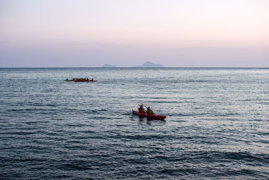 Santorini: Sunset Sea Kayak with Light Dinner - Why the kayak is a better view than a crowded boat