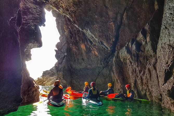 Sea Cave Kayaking Experience - Entering the sea caves by double kayak