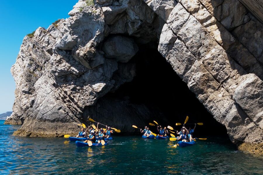 Sesimbra: Arrabida Natural Park & Caves Guided Kayaking Tour - Setting out beside Sesimbra’s harbour