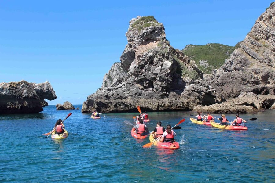 Sesimbra: Ribeiro Cavalo Beach, Caves, & Arrábida Kayak Tour - Setting out from Sesimbra Harbor