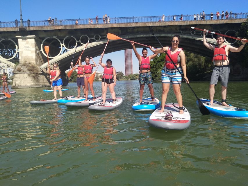 Seville: 2 Hour Paddle Surf Class - Heading beneath Triana Bridge