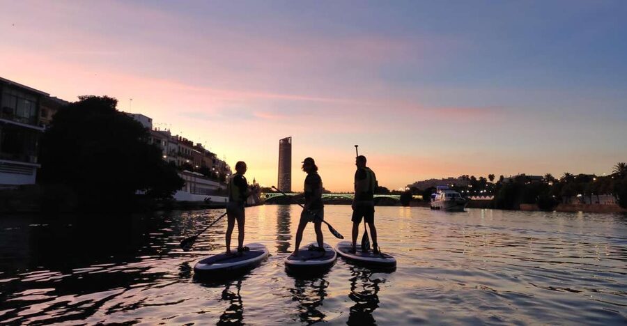 Seville: Sunset and Evening Paddle Boarding Tour - Setting out on the Guadalquivir before sunset