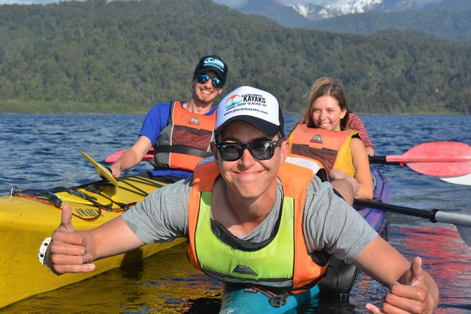 Small-Group Kayak Adventure from Franz Josef Glacier - Families, children, and the spray-skirt detail
