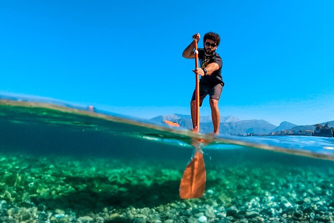 Small group paddle boarding tour to Bagni Regina Giovanna - Paddling from Marina Grande to Punta del Capo