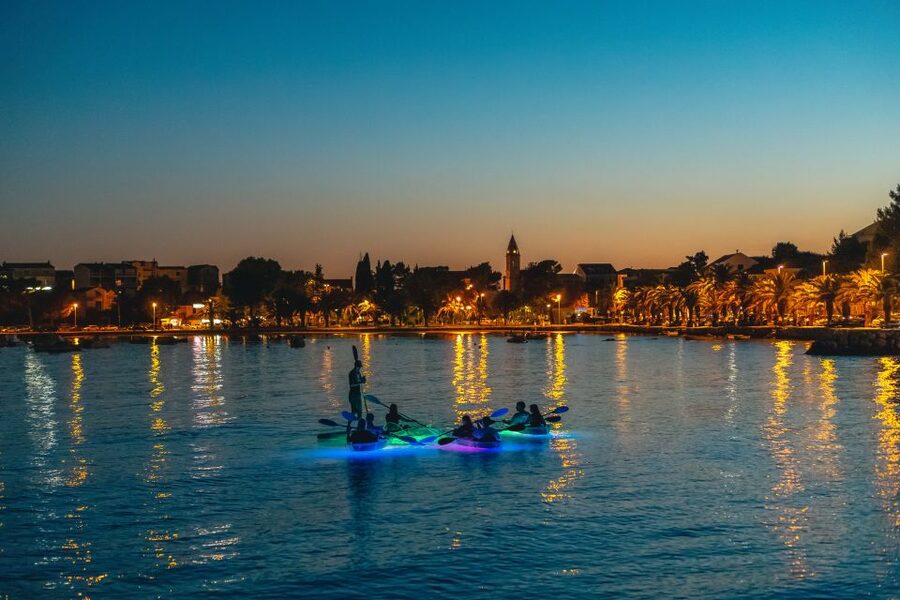 Split: Illuminated Evening Guided Kayaking Tour - Back on the sea, with Stobreč lights behind you