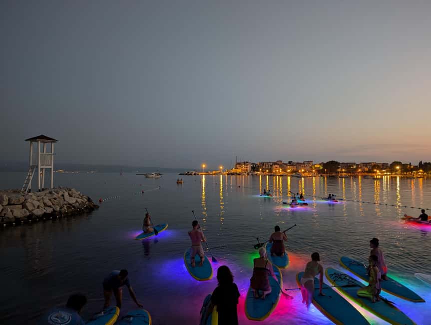 Split: Stand Up Paddleboard Night Glow Tour - Guides, safety, and the social side
