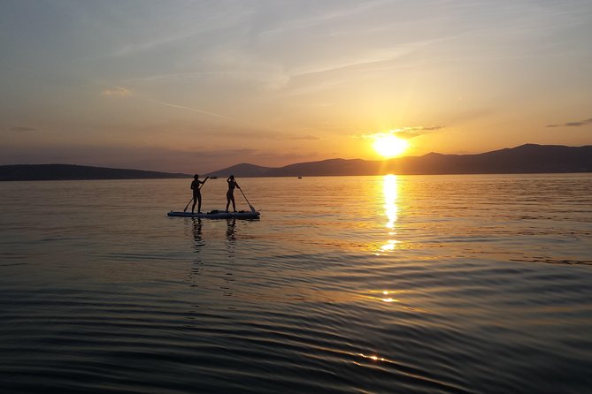 Split Sunset Stand Up Paddle Tour - Swimming, snorkeling, and the choice to cliff jump