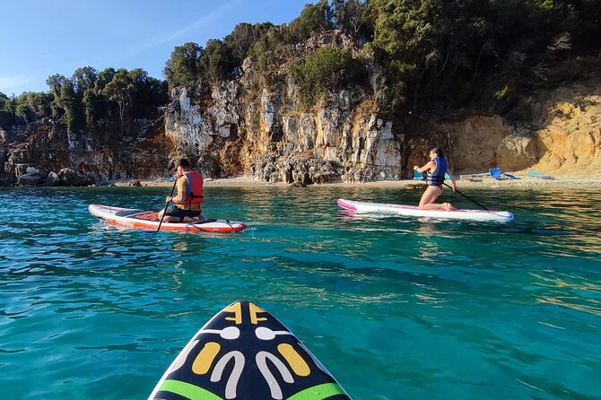 Stand Up Paddle-boarding around Ksamil islands (3 times a day) - Learning to stand before reaching the islands