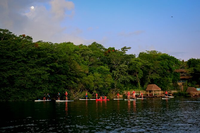 Sunrise Paddle Quest: Embrace the Dawn on Bacalar's Waters - A quiet pause at Cenote de la Bruja