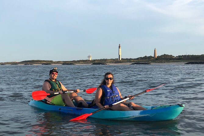 Sunset Dolphin Kayak Tours - Paddling the Chesapeake Bay shoreline