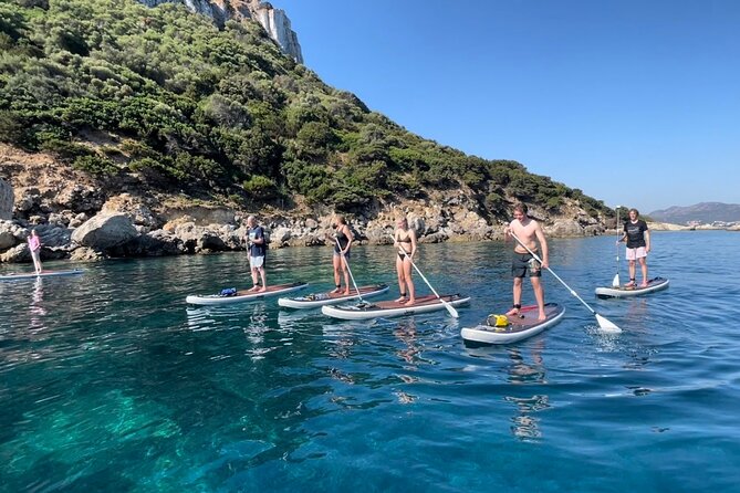 SUP Tour Experience Sunrise or Sunset breakfast or aperitif Olbia - Paddling through the Tavolara and Punta Coda Cavallo area