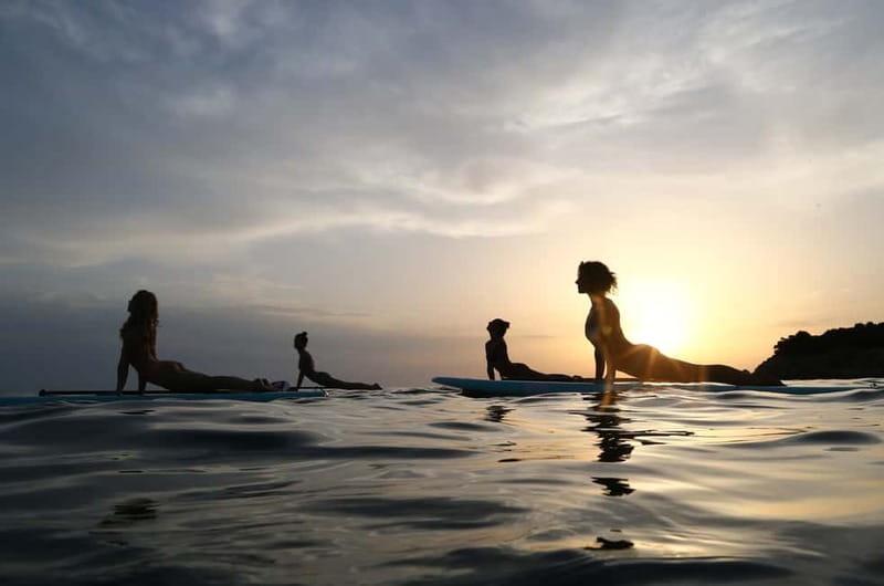 SUP Yoga in Stunning Stoja Bay: Balance, Breath & Connect - Paddling to the SUP yoga buoy