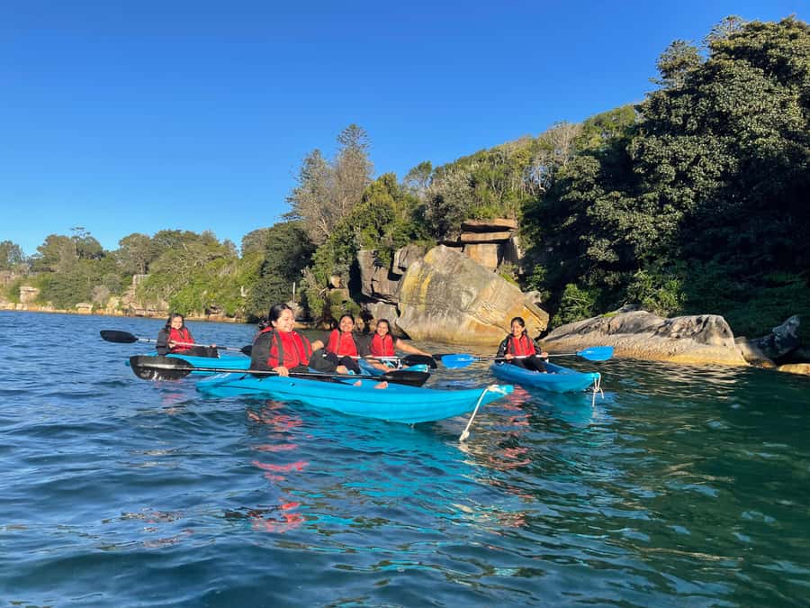 Sydney: Guided Kayak Tour of Manly Cove Beaches - A beach break with juice, snacks, and swimming