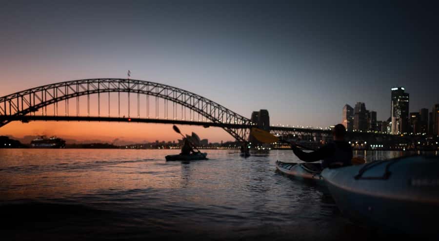 Sydney Sunrise Kayak Tour on Sydney Harbour - Under the Harbour Bridge at sunrise