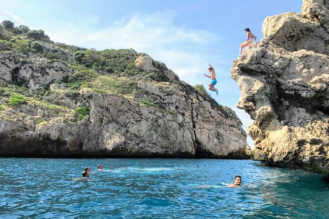 Uncharted Marine Reserve Cave, Snorkel & Cliff Jumping Kayak Tour - Getting back into the kayak is the real test